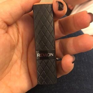 Revlon lipstick color in Soft Nude.